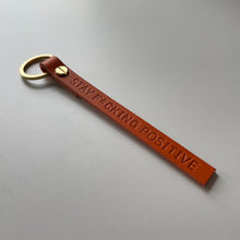 Load image into Gallery viewer, Stay F*cking Positive Keychain

